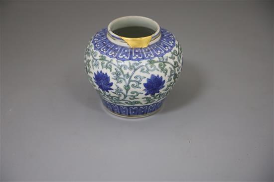 A rare Chinese doucai lotus flower jar, Wanli six character mark and probably of the period, (1573-1619), H. 9.5cm, D. 10.8cm, later